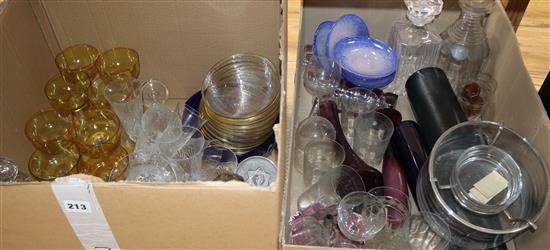 Ten cut glass champagne flutes, two decanters and a blue glass dish and assorted glassware